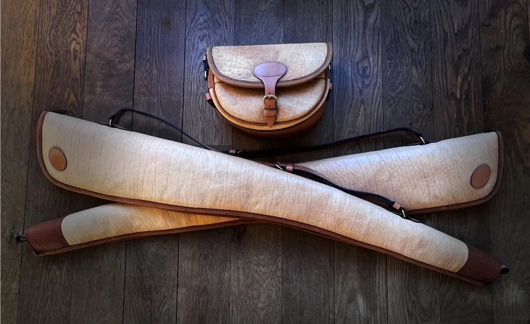 Matched Pair of Shotgun Slips and Leather Cartridge bad made with Buffalo Skins.