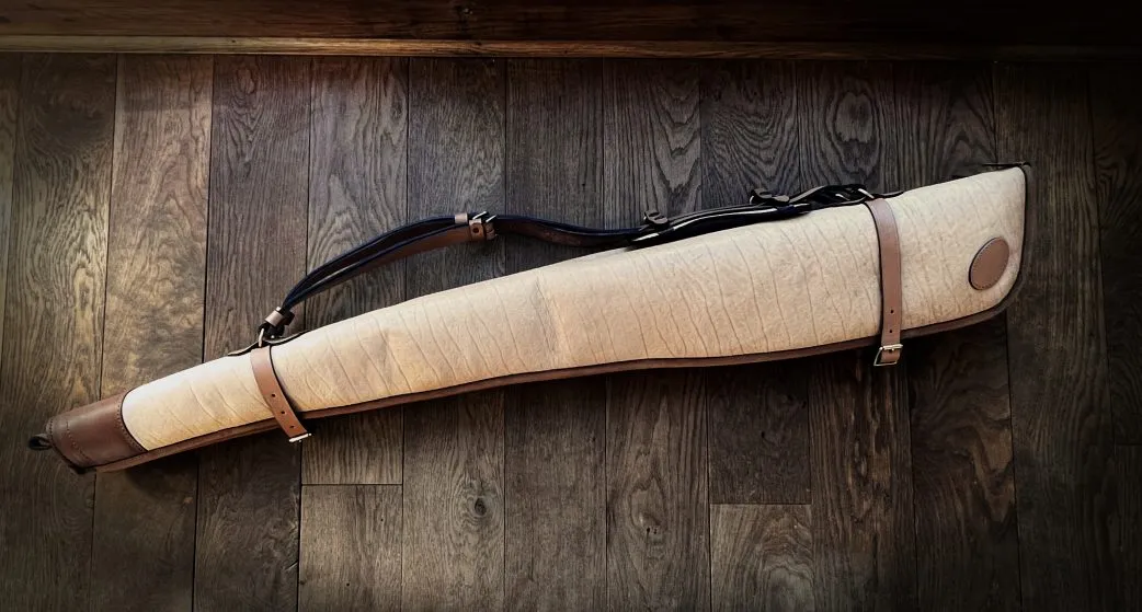 Matched Pair of Shotgun Slips made with Buffalo Skins.